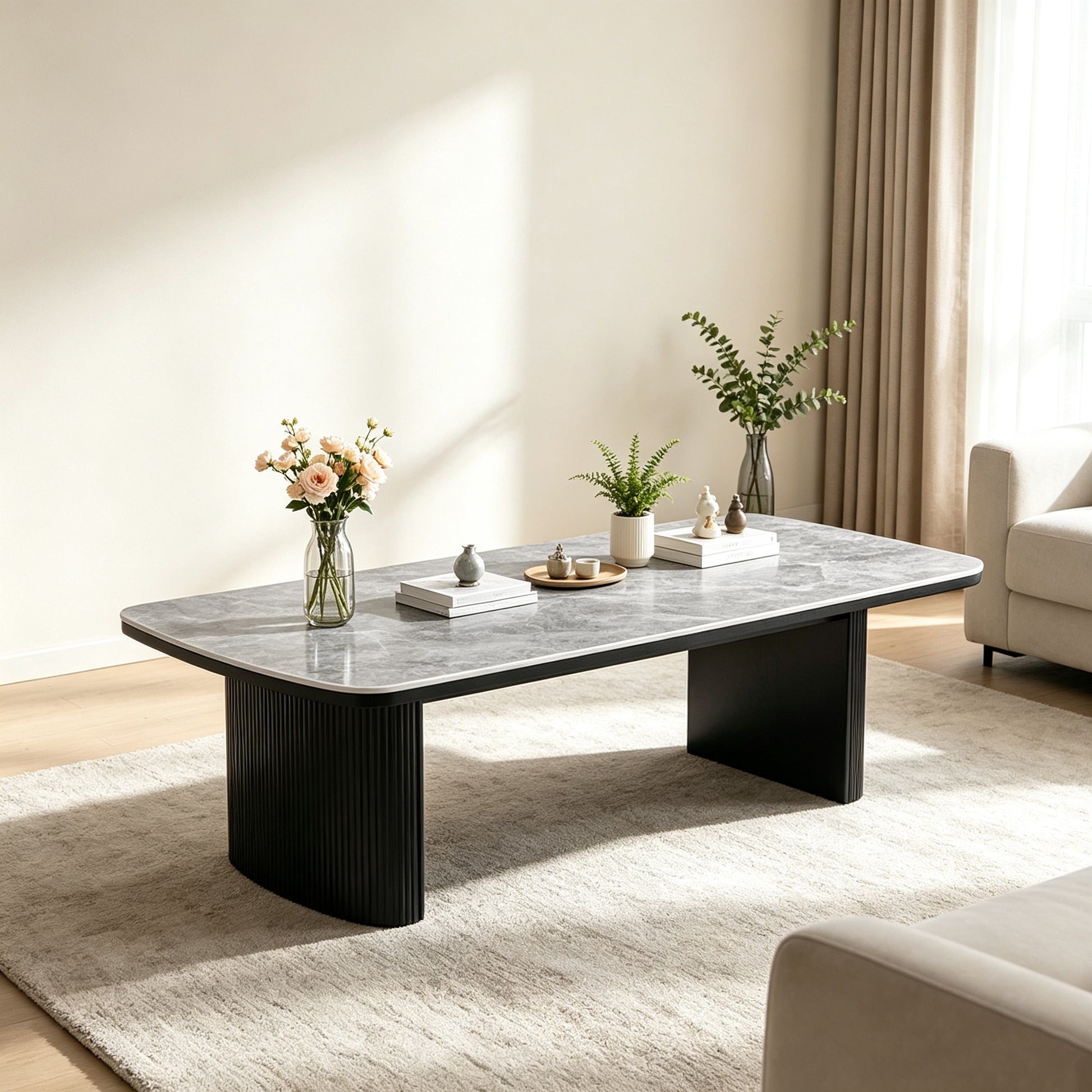 Aden Coffee Table with grey ceramic top and ribbed black legs