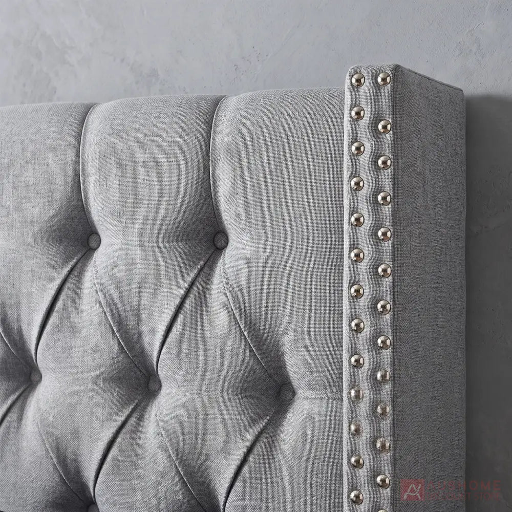 Grey wingback storage bed with padded headboard