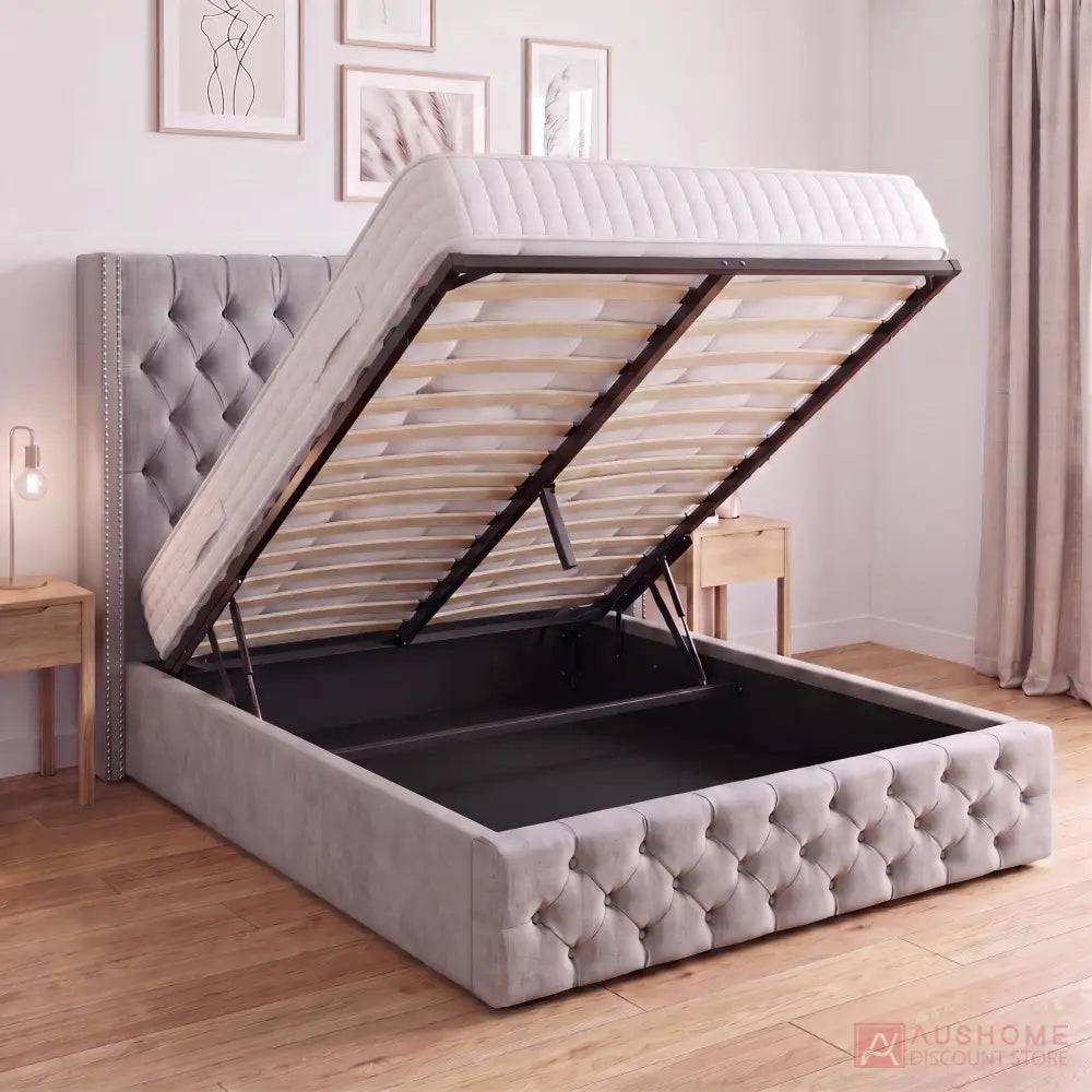 Grey fabric gas lift storage bed