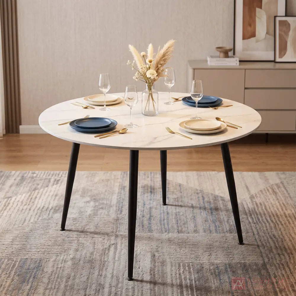 Super 95 round ceramic dining table with metal legs